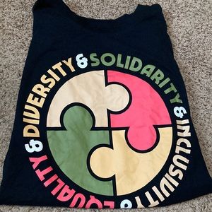 diversity ; solidarity ; inclusivity ; equality black puzzle tee